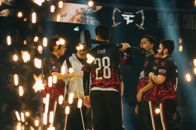 FaZe Clan players celebrate on stage after the grand final.